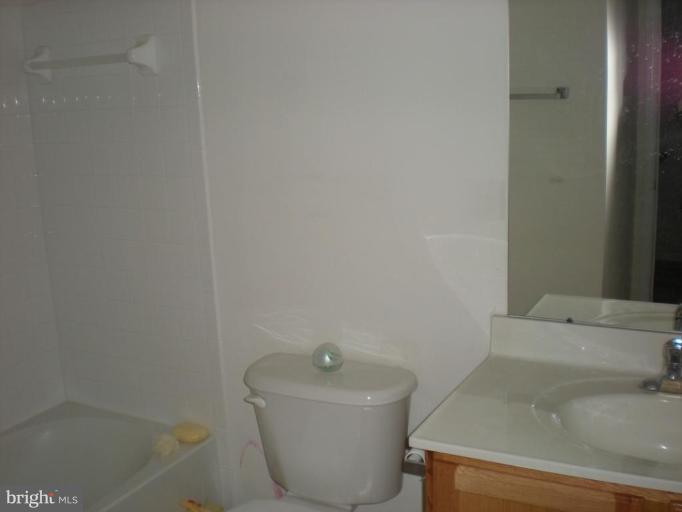 619 Tivoli Road Frederick, MD 21703 - Photo 5 of 5 a bathroom with a sink and a bathtub