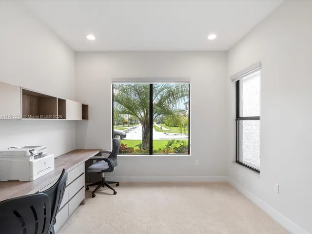 a bathroom with a shower sink and mirror
