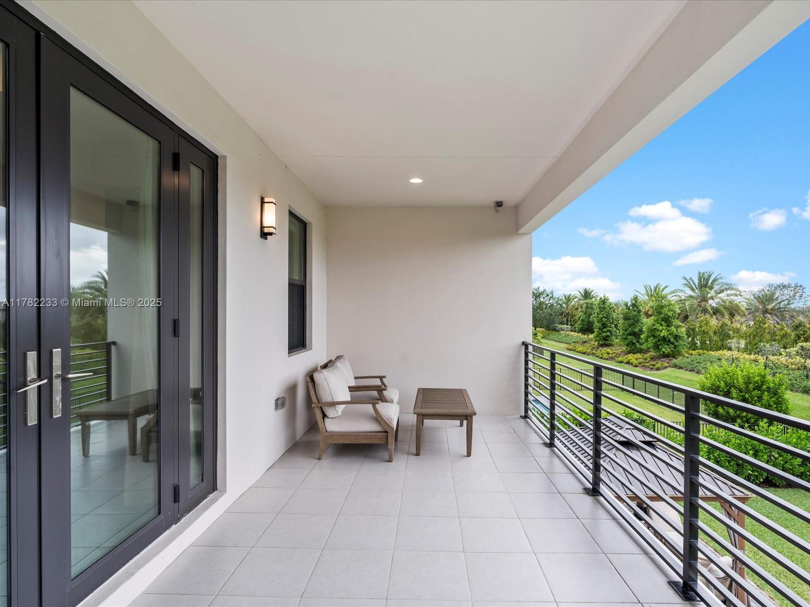 20324 Castle Stuart Avenue Boca Raton, FL 33434 - Photo 53 of 79 a view of hotel and patio