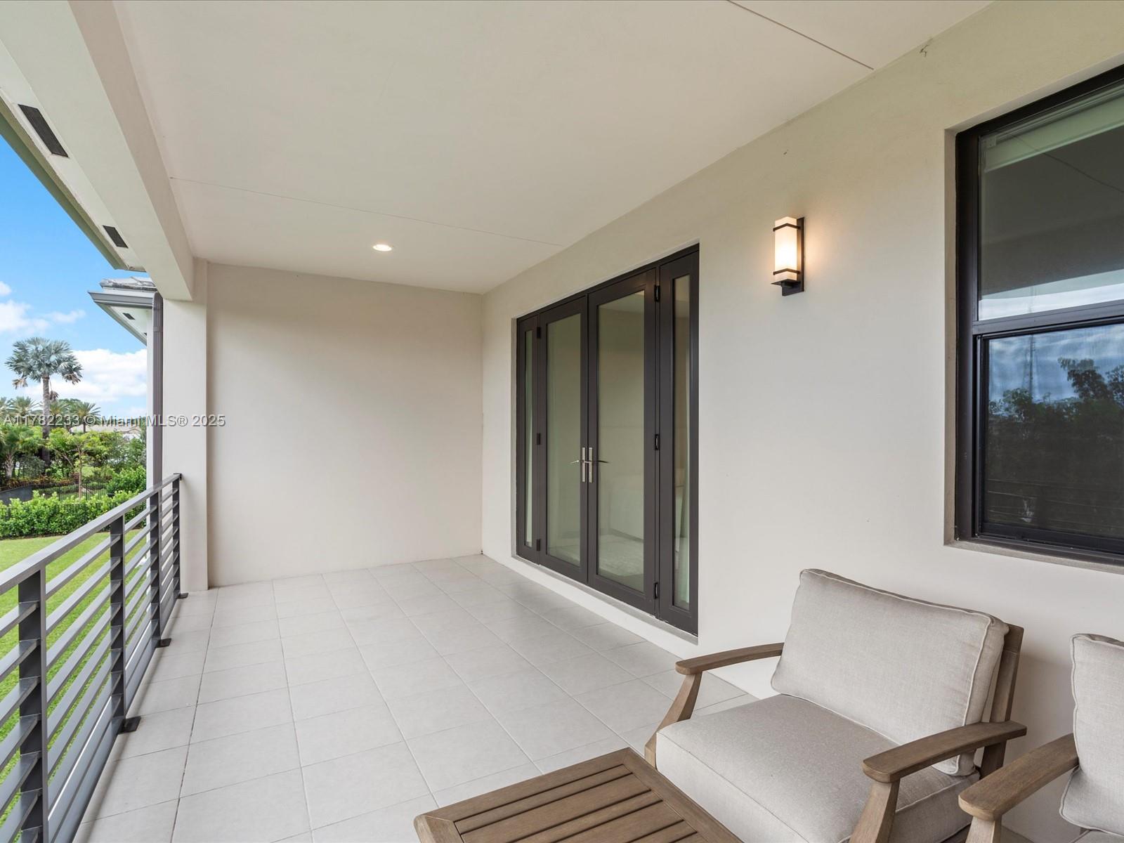 20324 Castle Stuart Avenue Boca Raton, FL 33434 - Photo 55 of 79 a view of room with window and furniture