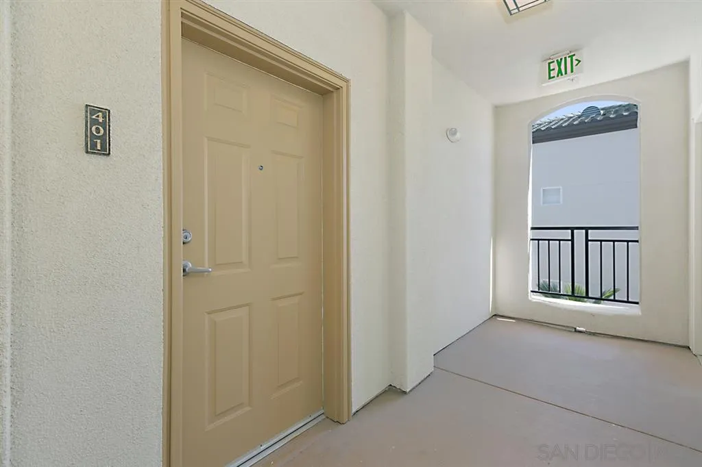 9237 Regents Road, Unit K401 La Jolla, CA 92037 - Photo 20 of 25 a view of a hallway with front door