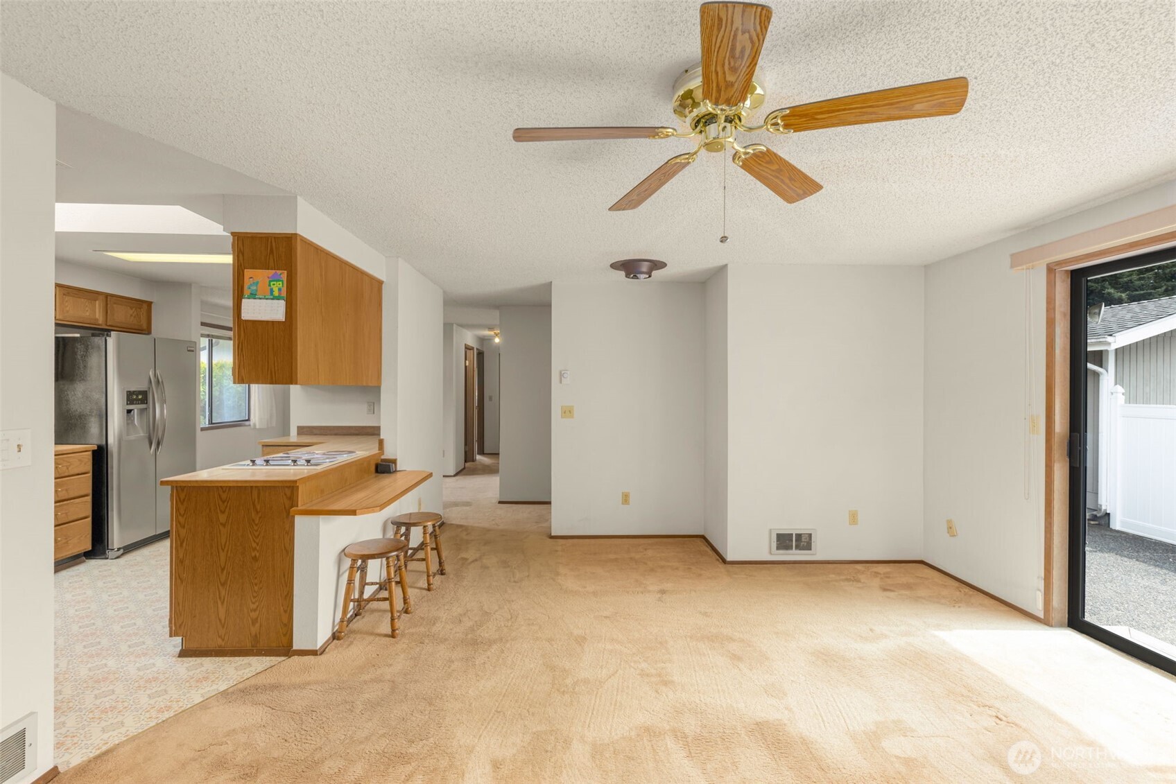 24124 8th Place West Bothell, WA 98021 - Photo 16 of 39 a view of a livingroom with furniture and a ceiling fan