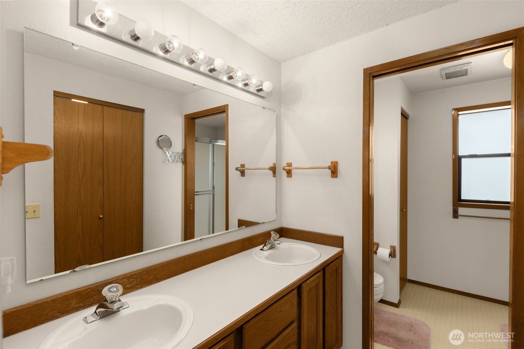24124 8th Place West Bothell, WA 98021 - Photo 21 of 39 a bathroom with a sink and a mirror