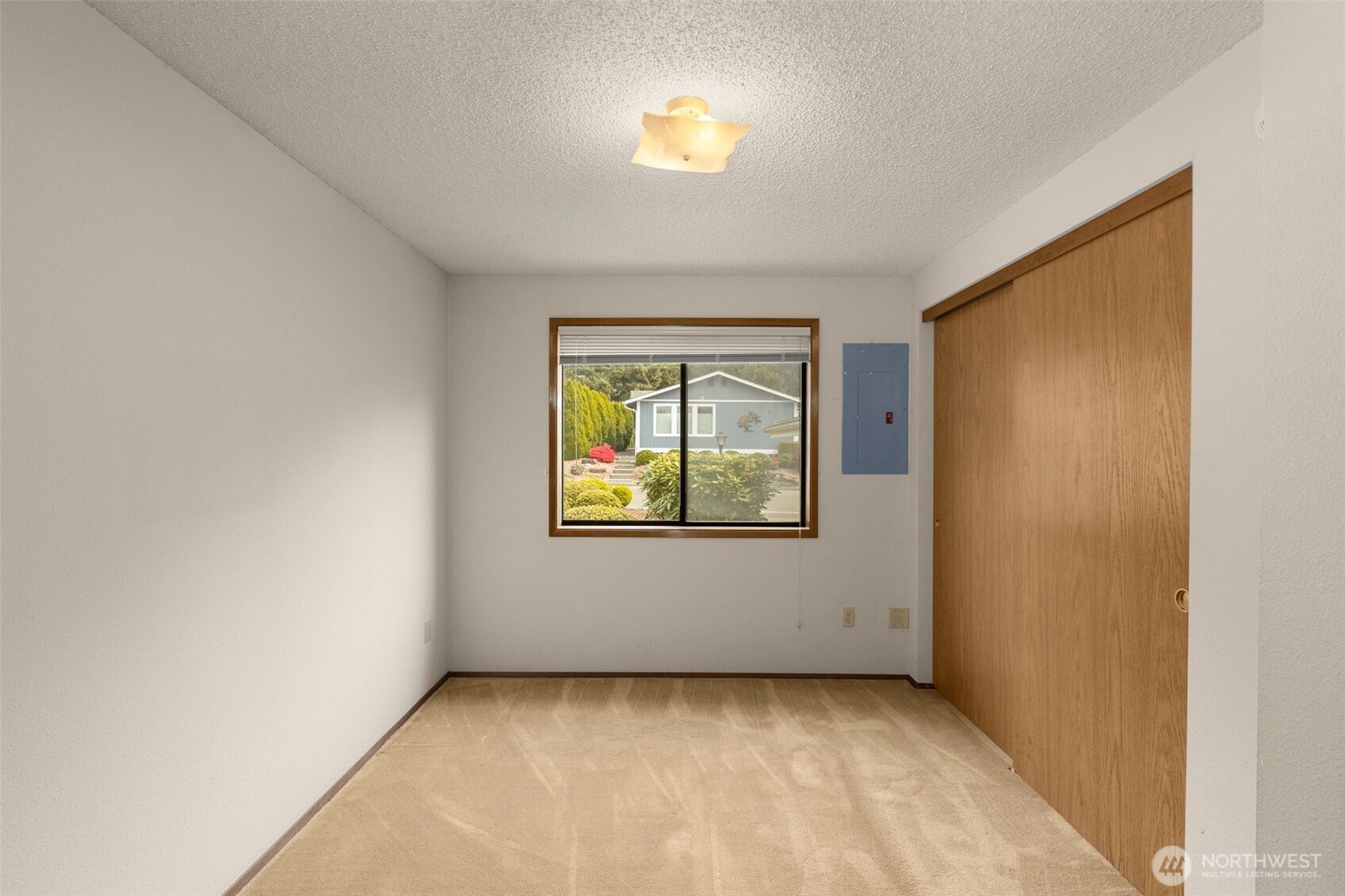 24124 8th Place West Bothell, WA 98021 - Photo 23 of 39 an empty room with windows and closet