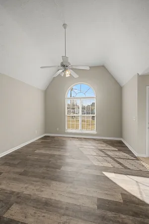 a view of an empty room with window
