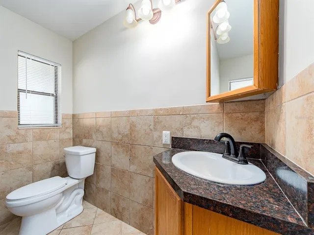 a bathroom with a sink and a toilet