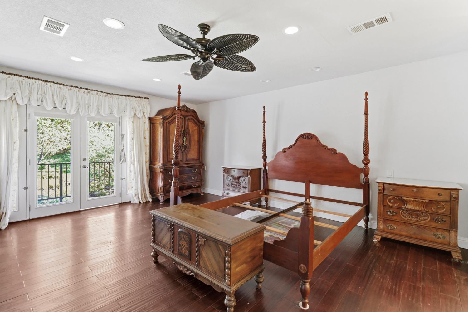 4330 Cavitt Stallman Road Granite Bay, CA 95746 - Photo 22 of 85 a living room with furniture a window and a chandelier