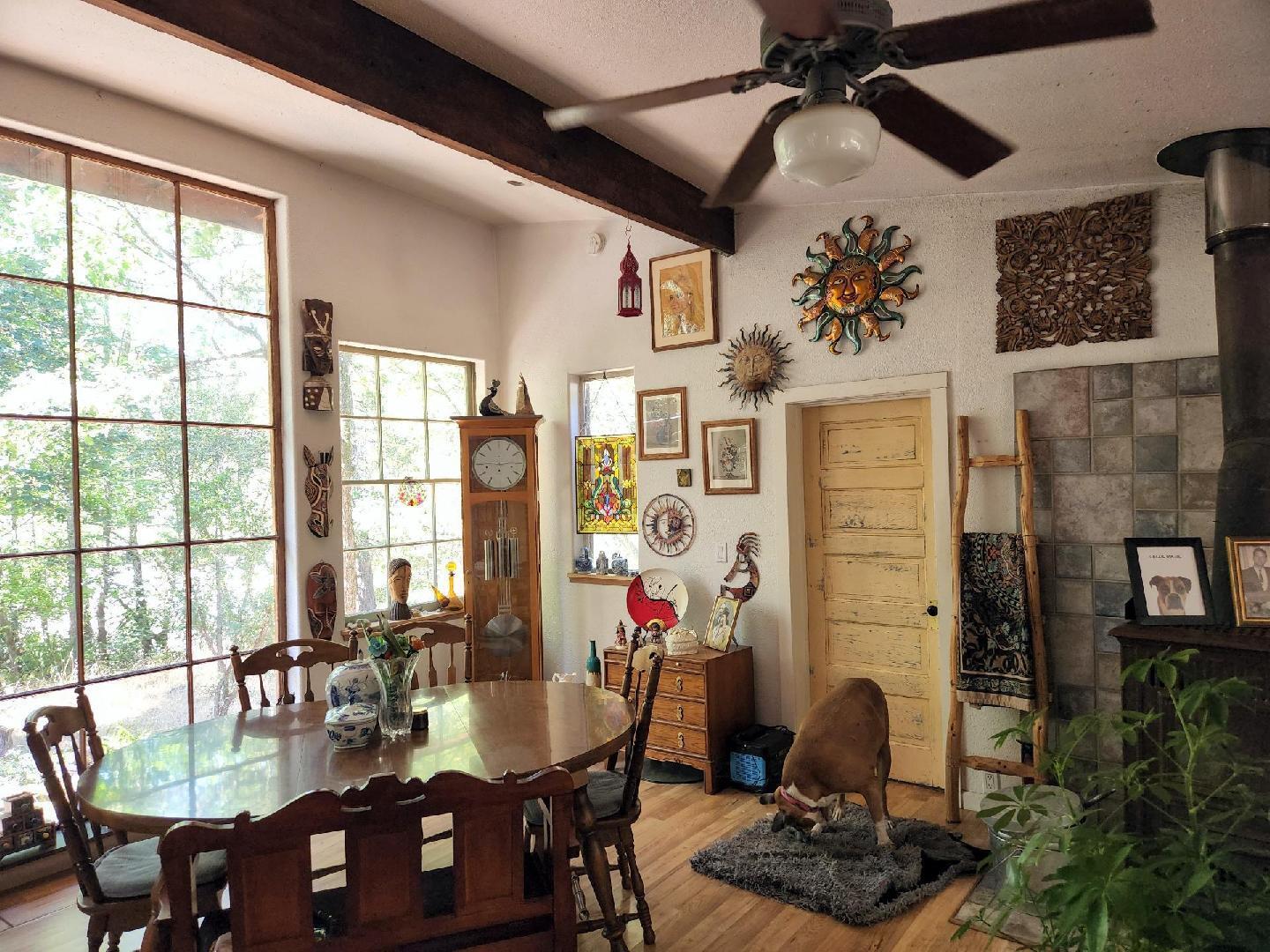 12100 Takilma Road Cave Junction, OR 97523 - Photo 7 of 20 a living room with furniture and wooden floor