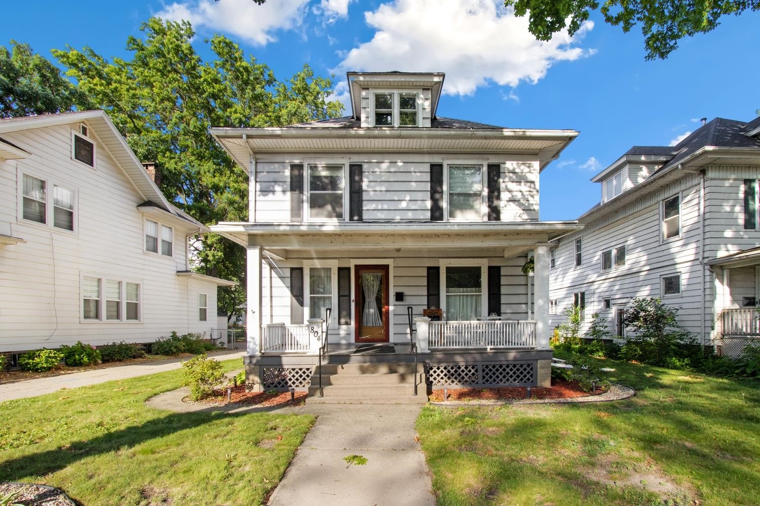 front view of a house with a patio