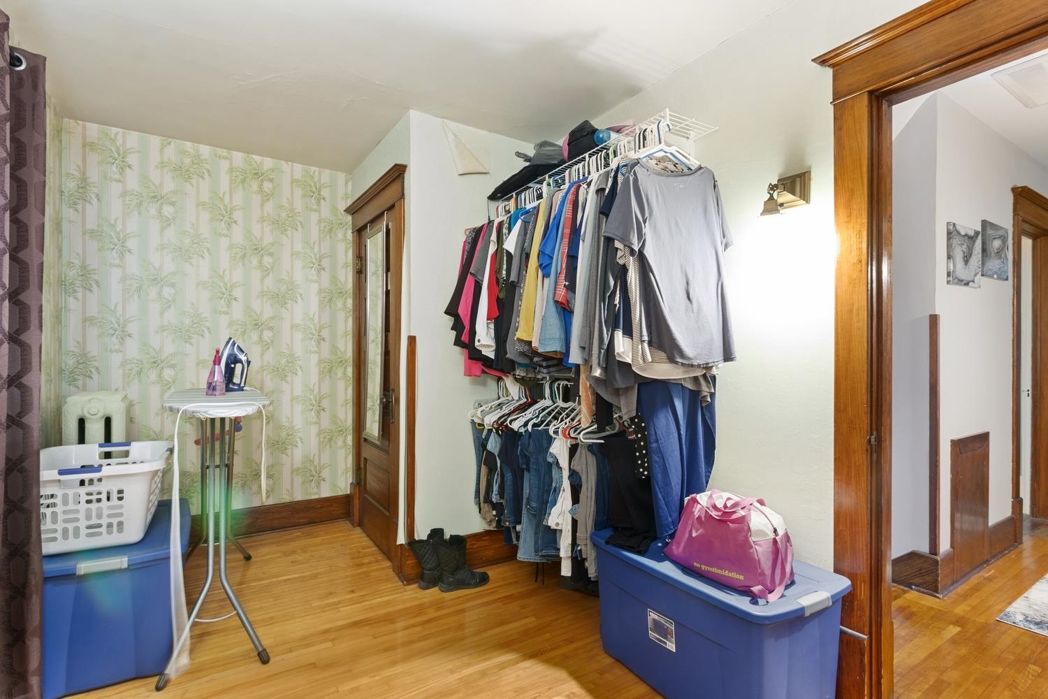 804 Locust Street Sterling, IL 61081 - Photo 23 of 25 a view of walk in closet with clothes and shoes
