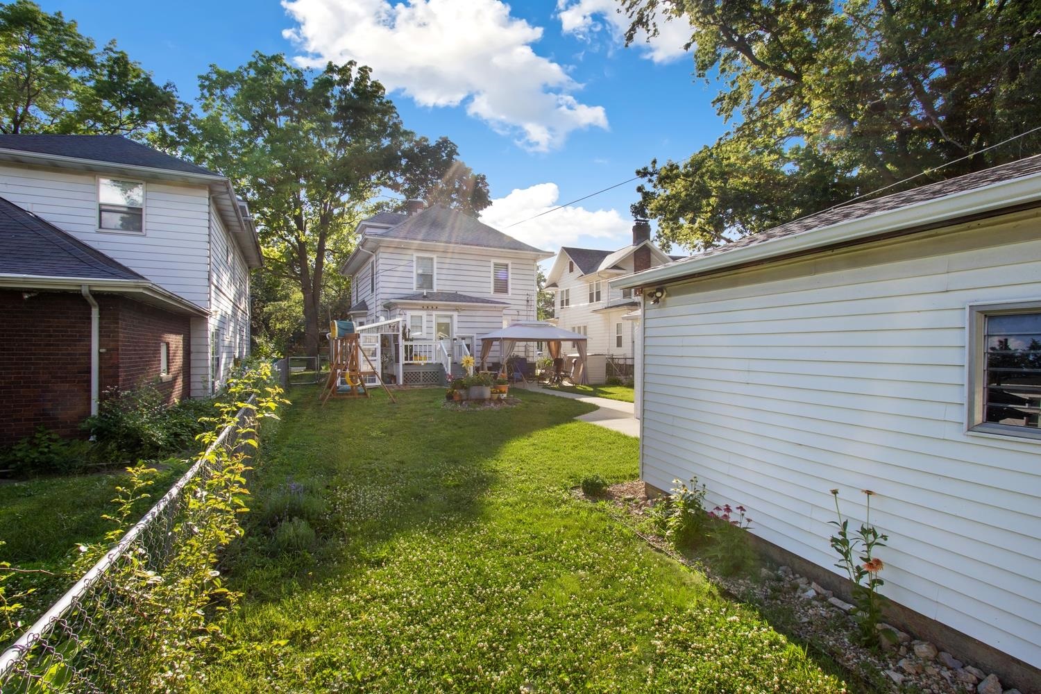 804 Locust Street Sterling, IL 61081 - Photo 24 of 25 a front view of a house with garden