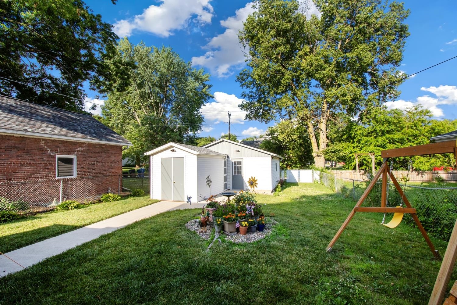 804 Locust Street Sterling, IL 61081 - Photo 5 of 25 a view of a house with a yard
