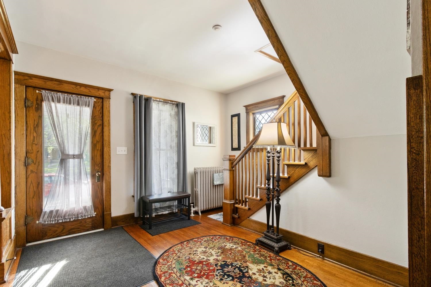 804 Locust Street Sterling, IL 61081 - Photo 6 of 25 a view of an entryway with wooden floor and door