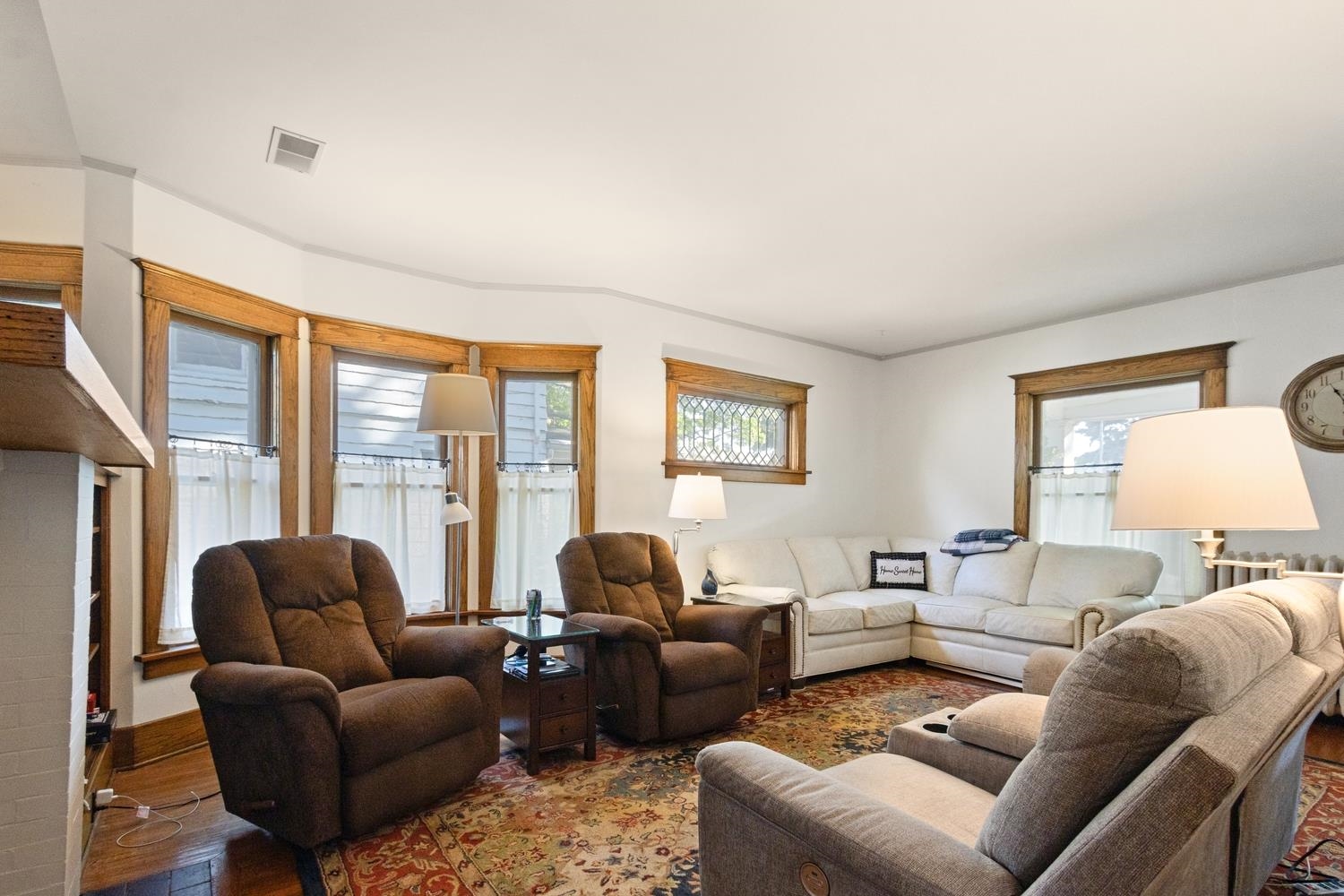 804 Locust Street Sterling, IL 61081 - Photo 8 of 25 a living room with furniture and a large window