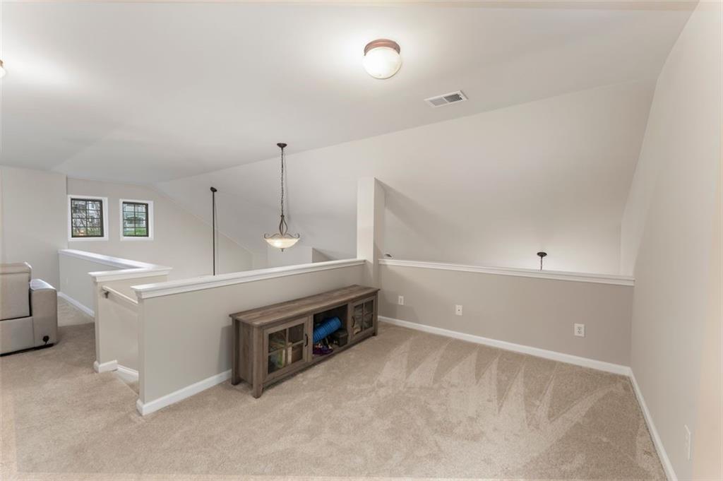 113 Tyson Woods Road Acworth, GA 30102 - Photo 29 of 37 a view of an empty room with a window