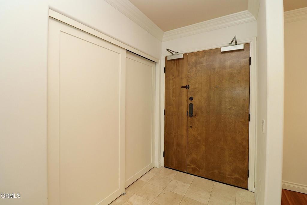 3855 Ingraham Street, Unit 204 Los Angeles, CA 90005 - Photo 1 of 35 a bathroom with a shower and a glass door