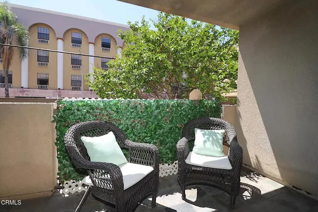 a view of a chairs in balcony