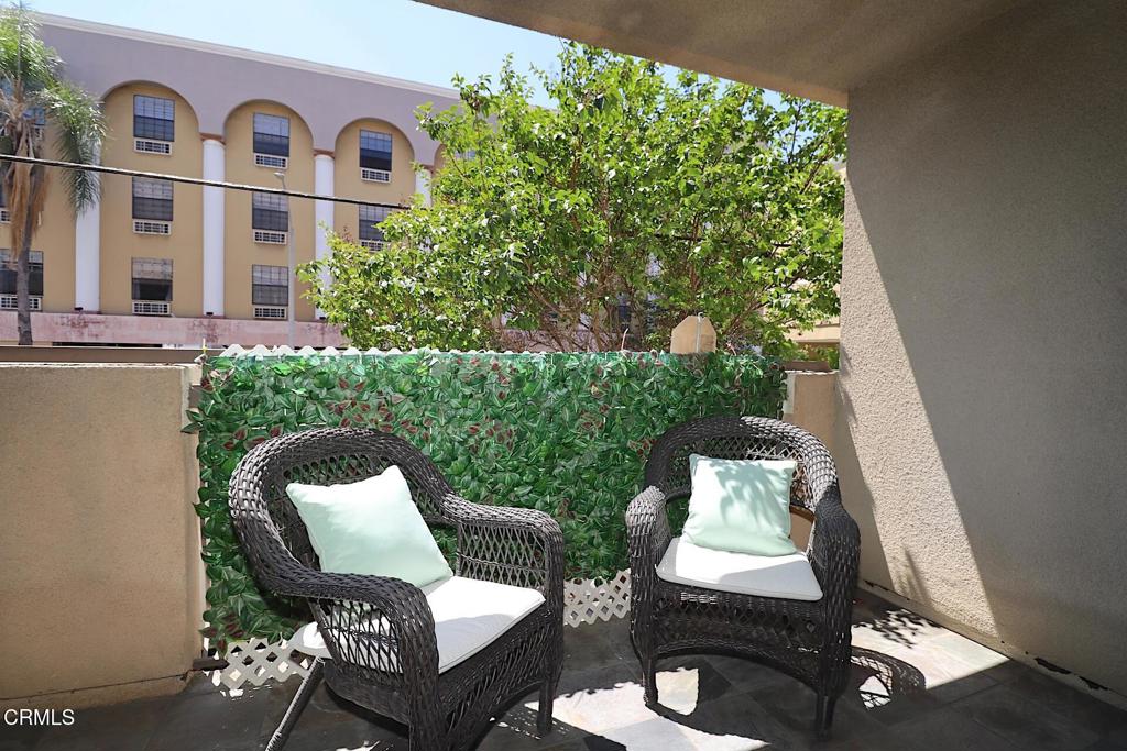 3855 Ingraham Street, Unit 204 Los Angeles, CA 90005 - Photo 9 of 35 a view of a chairs in balcony