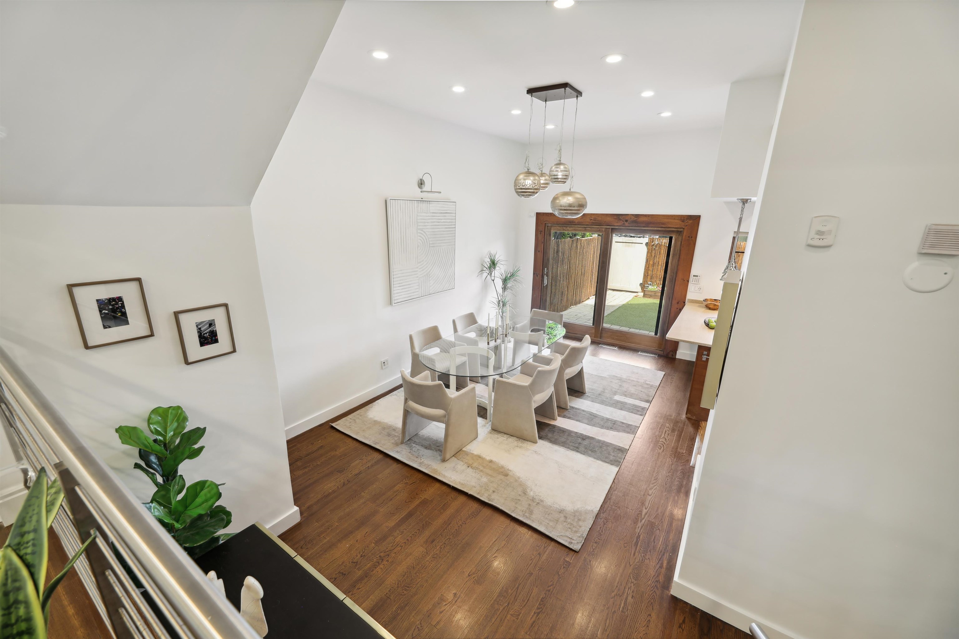 310 9th Street Jersey City, NJ 07302 - Photo 5 of 34 a view of a living room and dining room