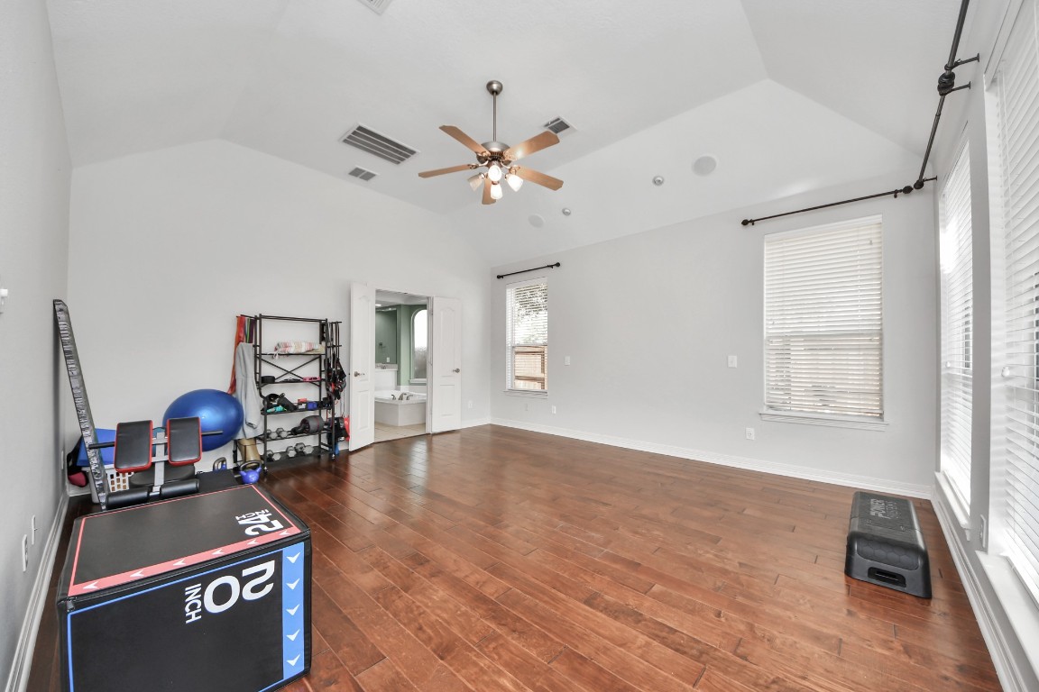 5703 Brennan Ridge Lane Katy, TX 77450 - Photo 22 of 45 a view of workspace with wooden floor and ceiling fan
