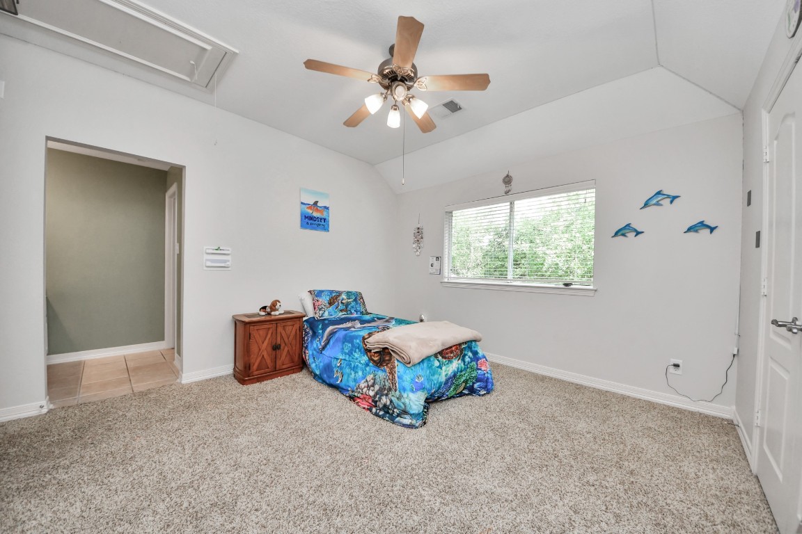 5703 Brennan Ridge Lane Katy, TX 77450 - Photo 34 of 45 a room with toys and ceiling fan