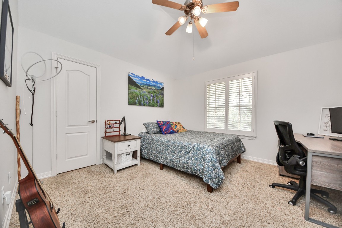 5703 Brennan Ridge Lane Katy, TX 77450 - Photo 36 of 45 a living room with furniture and a window
