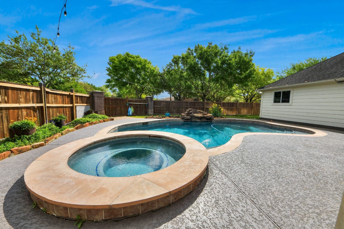 5703 Brennan Ridge Lane Katy, TX 77450 - Photo 44 of 45 a view of outdoor space yard swimming pool