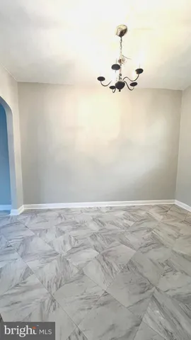 a view of a room with an empty space