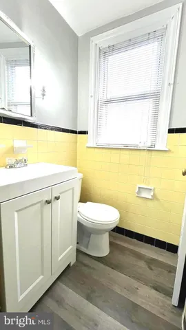 a bathroom with a toilet a sink and a bathtub