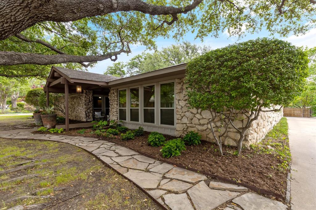 4605 Cloudview Road Fort Worth, TX 76109 - Photo 1 of 1 a front view of a house with garden