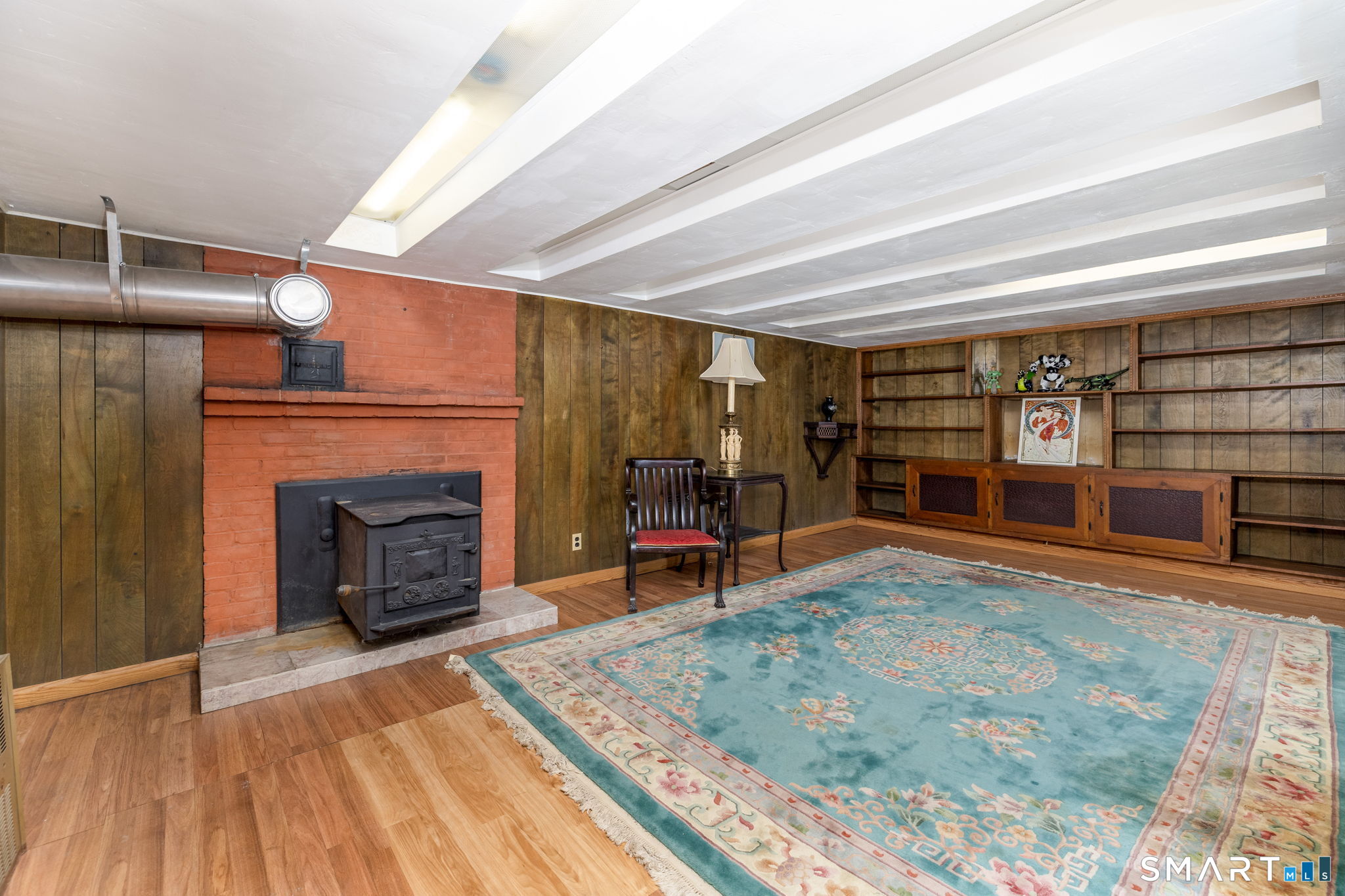 2 Barn Hill Road Bloomfield, CT 06002 - Photo 29 of 40 Fantastic great room with wood stove / fire place.