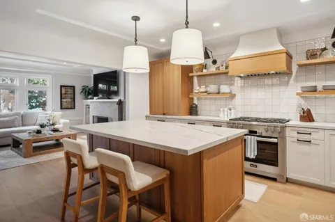 a bedroom with bed and balcony