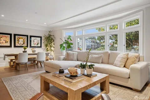 a bedroom with a bed and hallway