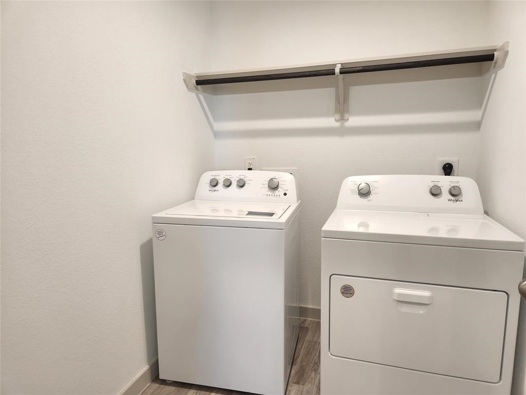 7826 Sleek Flock Lane Rosharon, TX 77583 - Photo 10 of 16 a utility room with dryer and washer