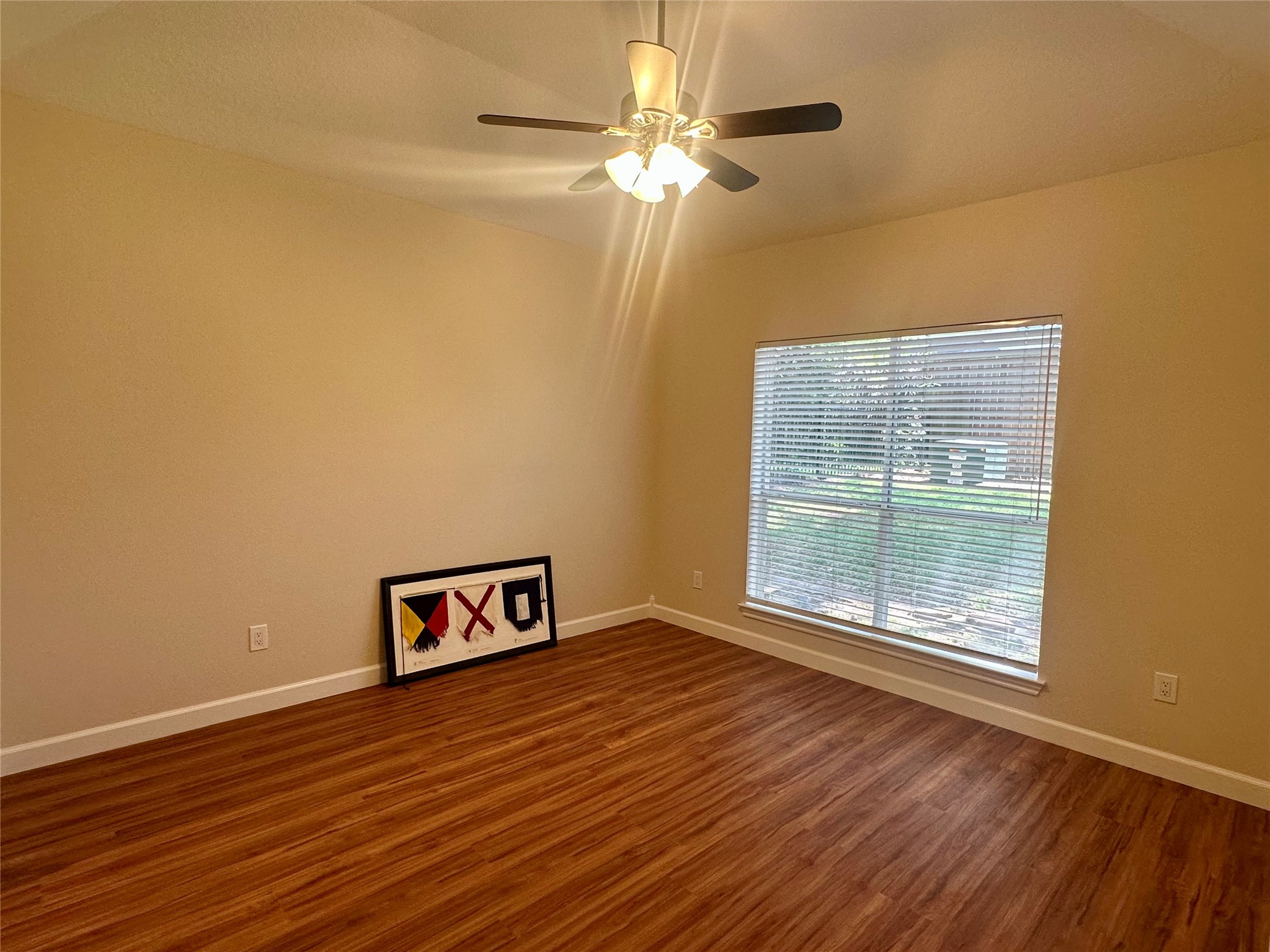 3122 Hemingway Drive Montgomery, TX 77356 - Photo 11 of 15 an empty room with windows and ceiling fan