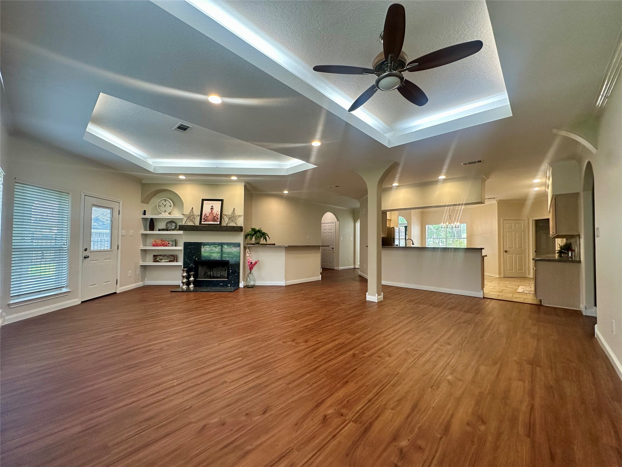 3122 Hemingway Drive Montgomery, TX 77356 - Photo 4 of 15 a view of empty room with wooden floor and fireplace