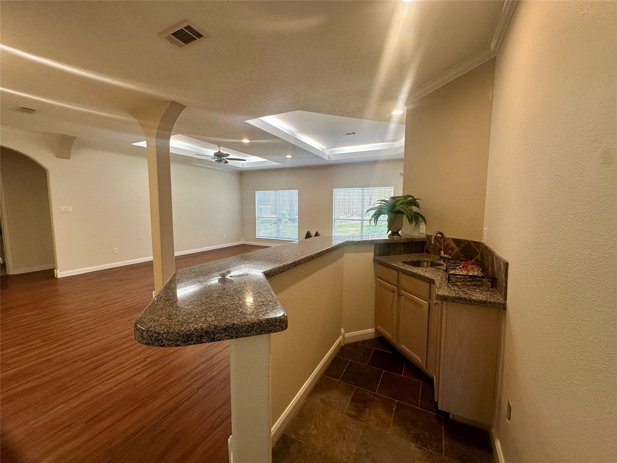 3122 Hemingway Drive Montgomery, TX 77356 - Photo 5 of 15 a kitchen with stainless steel appliances granite countertop a stove a sink and a refrigerator