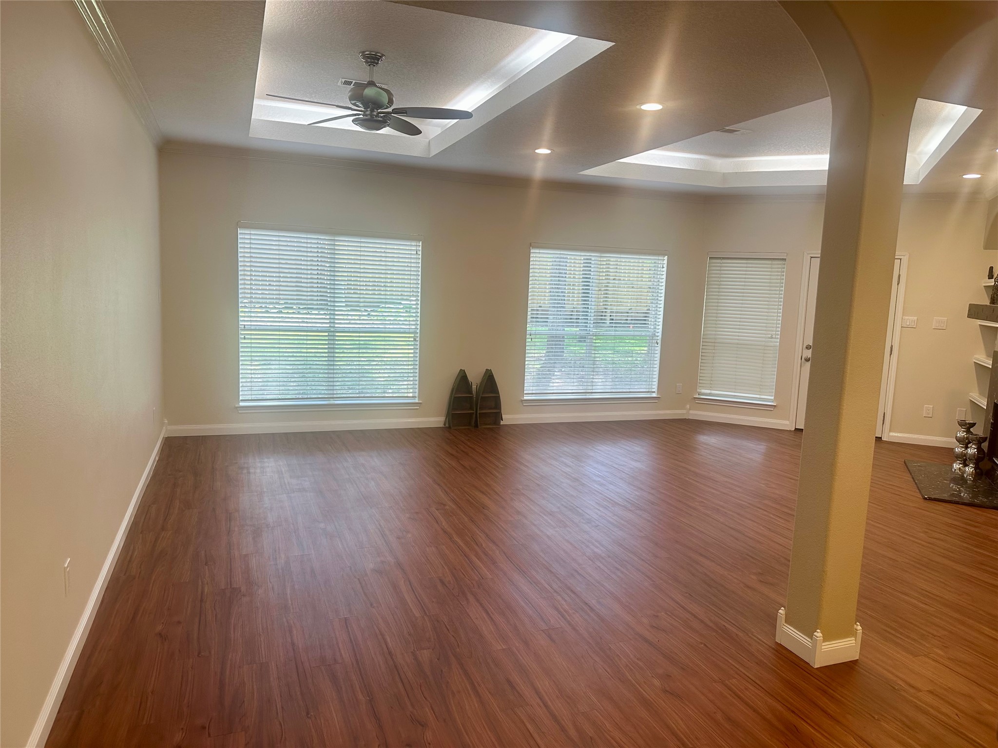 3122 Hemingway Drive Montgomery, TX 77356 - Photo 6 of 15 an empty room with wooden floor and windows