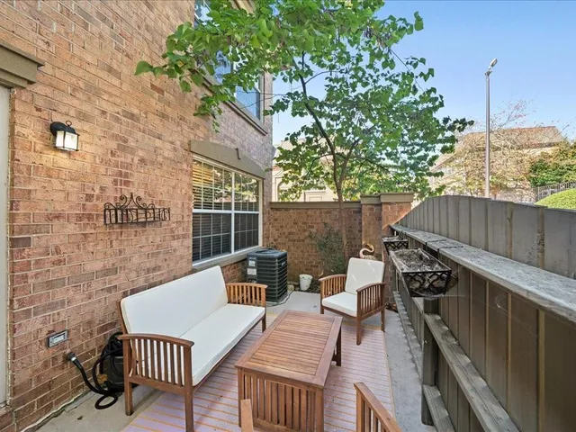 a view of a roof deck with couches