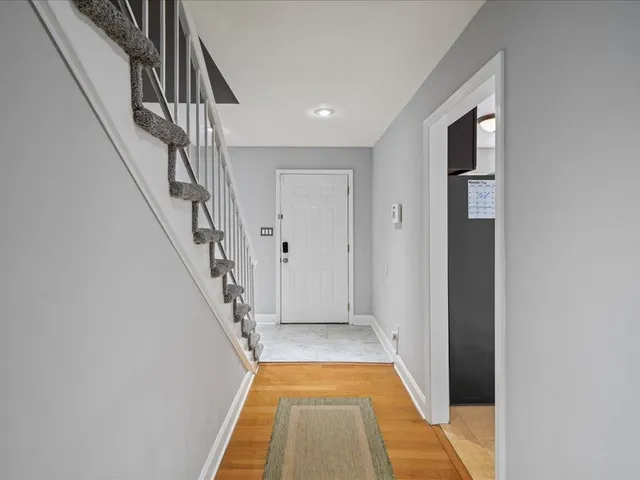 a view of entryway with a front door