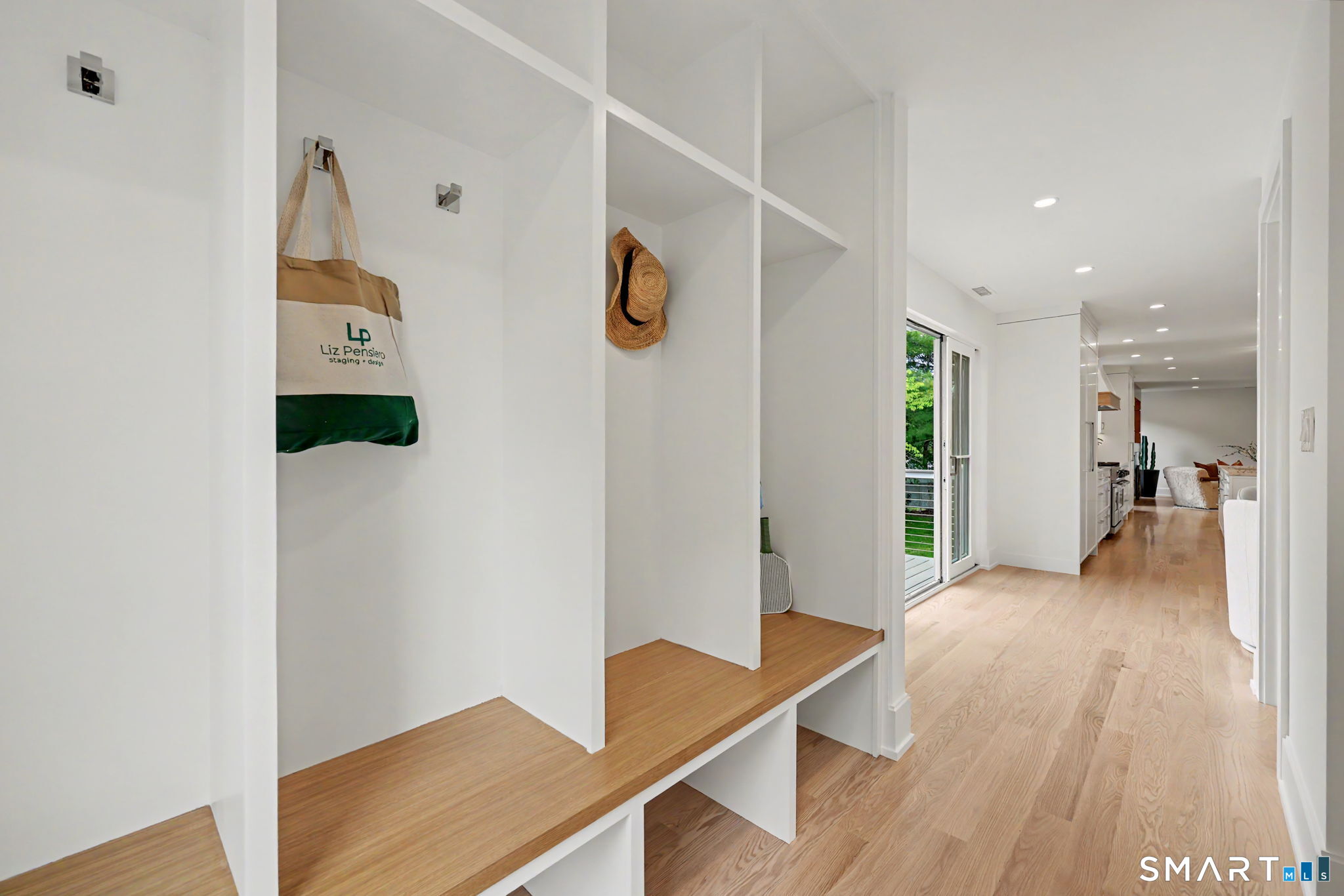 1076 Westover Road Stamford, CT 06902 - Photo 10 of 40 Well-designed mudroom access from garage, located next to Powder room and sliding doors to deck