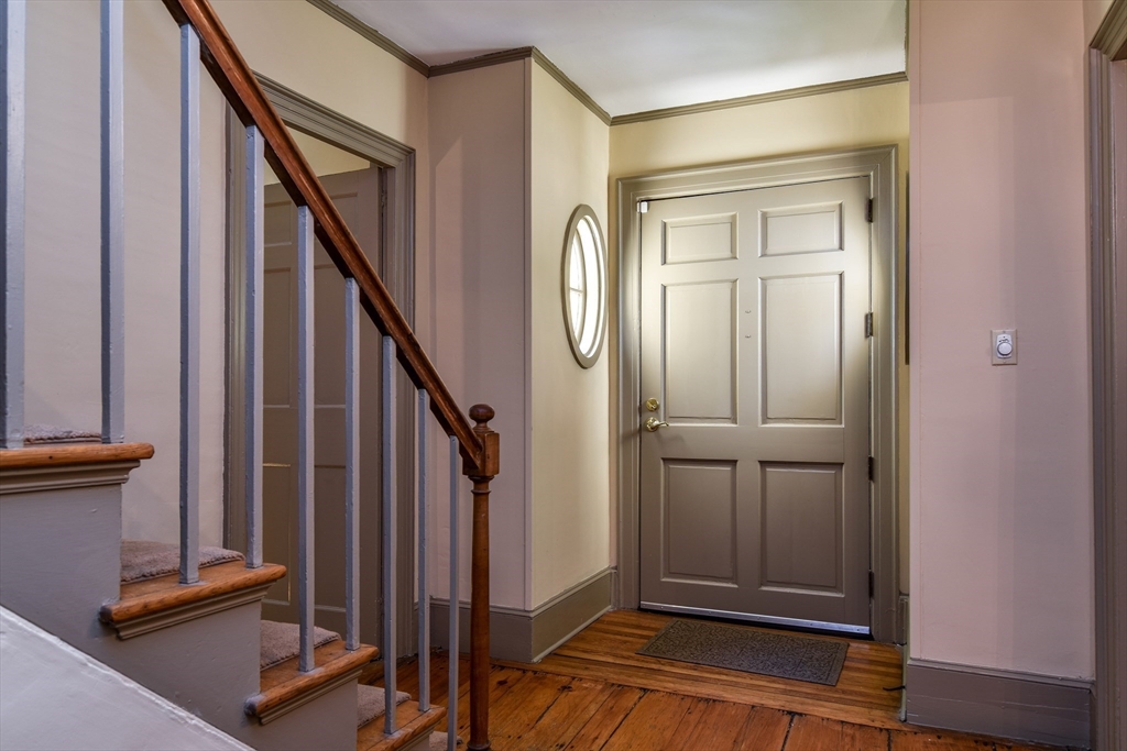 33 Grove Street Framingham, MA 01701 - Photo 13 of 33 a view of front door with stairs