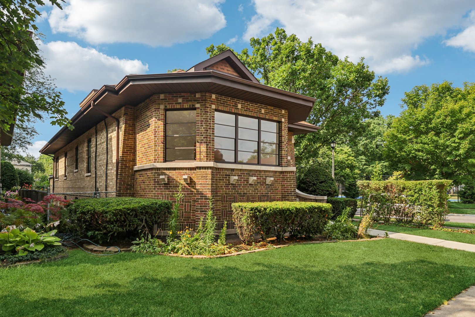 5253 Cleveland Street Skokie, IL 60077 - Photo 1 of 57 a front view of a house with a yard