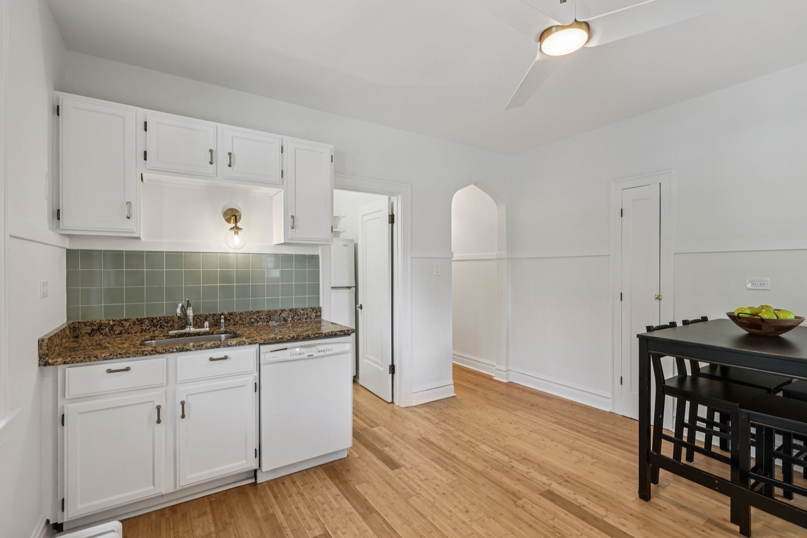5253 Cleveland Street Skokie, IL 60077 - Photo 14 of 57 a kitchen with a sink a cabinetry and cabinets