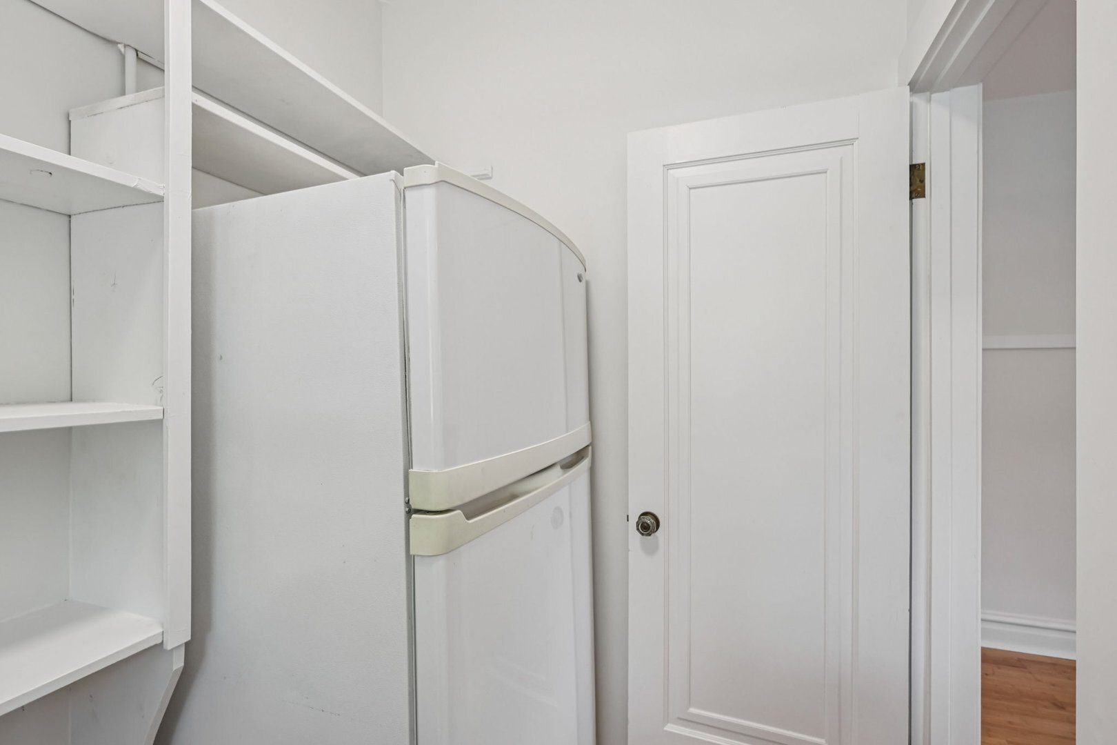 5253 Cleveland Street Skokie, IL 60077 - Photo 18 of 57 a bathroom with a glass shower door