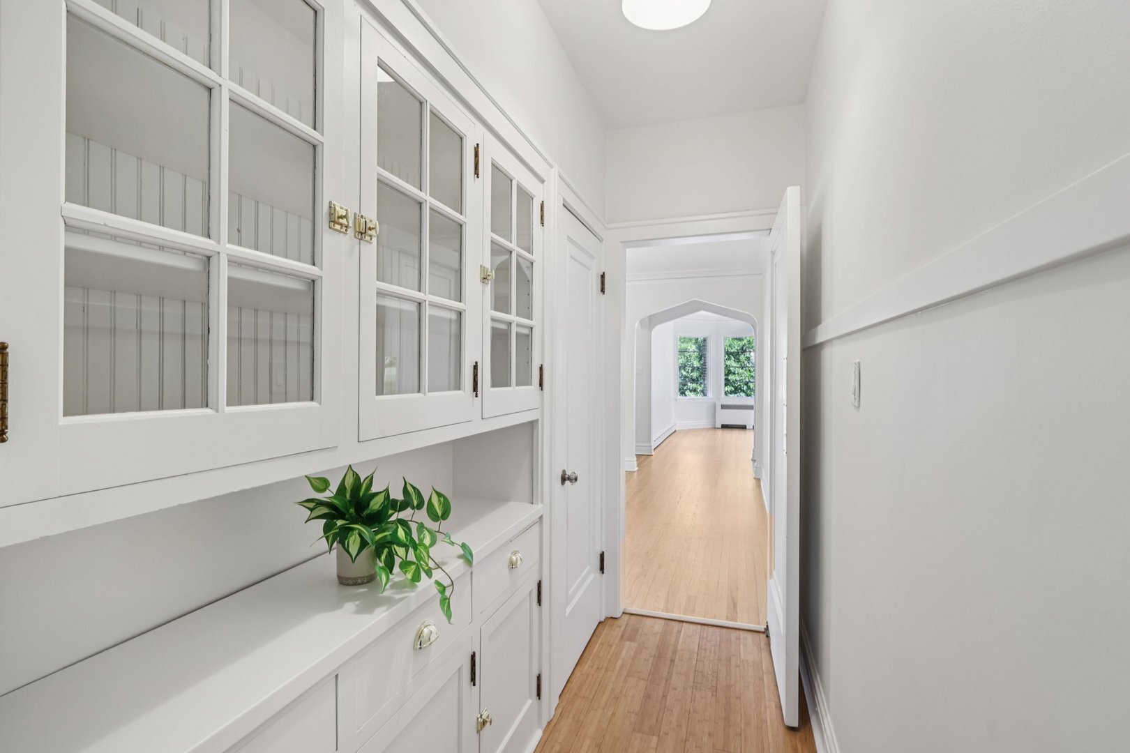 5253 Cleveland Street Skokie, IL 60077 - Photo 19 of 57 a view of an entryway with wooden floor