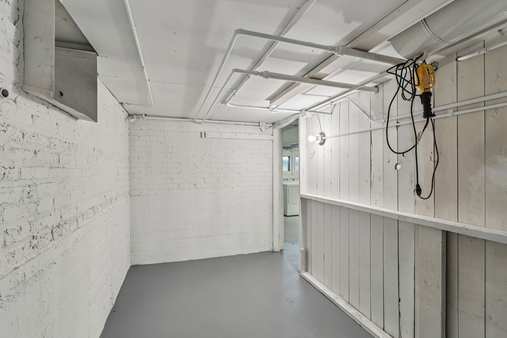5253 Cleveland Street Skokie, IL 60077 - Photo 42 of 57 a view of a room with racks on the wall