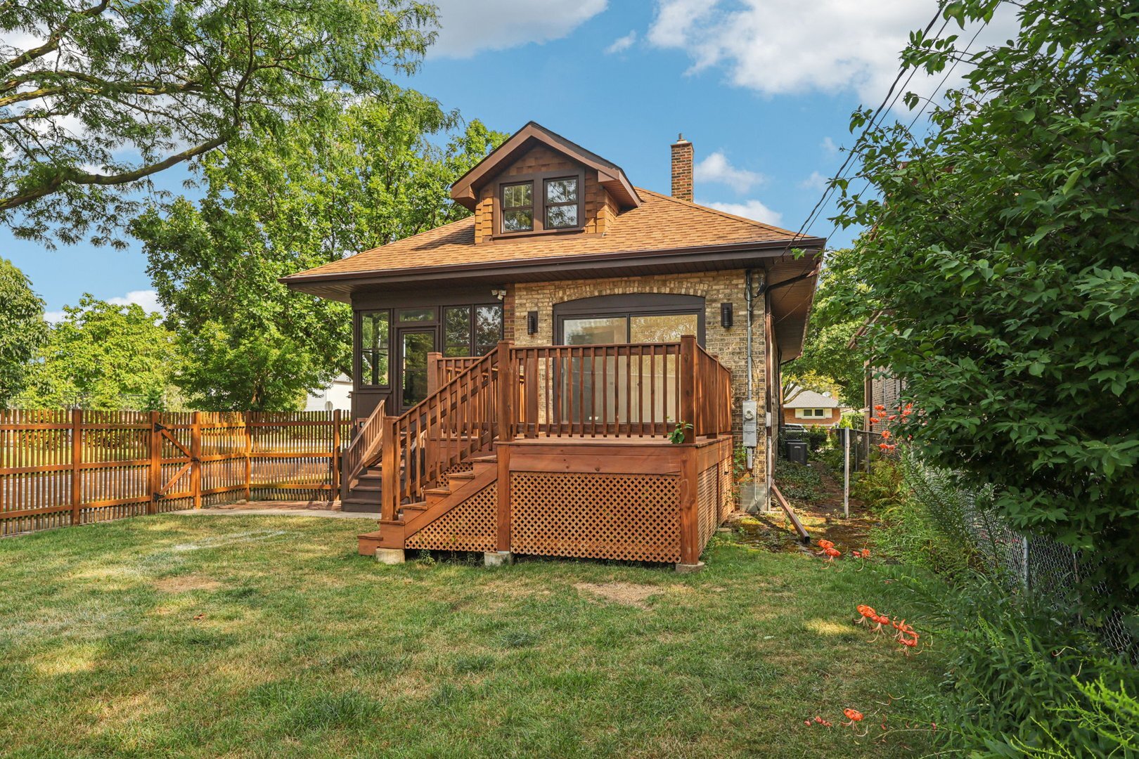 5253 Cleveland Street Skokie, IL 60077 - Photo 47 of 57 a front view of a house with garden