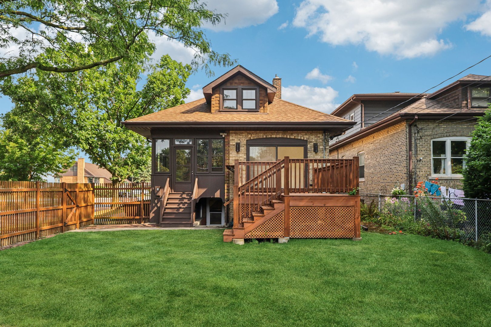 5253 Cleveland Street Skokie, IL 60077 - Photo 48 of 57 a front view of a house with garden