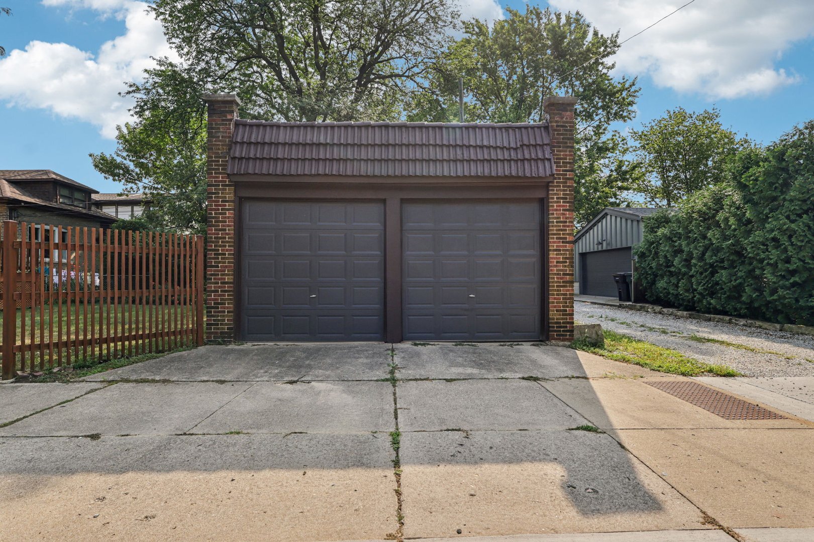 5253 Cleveland Street Skokie, IL 60077 - Photo 50 of 57 a view of a house with a small garden